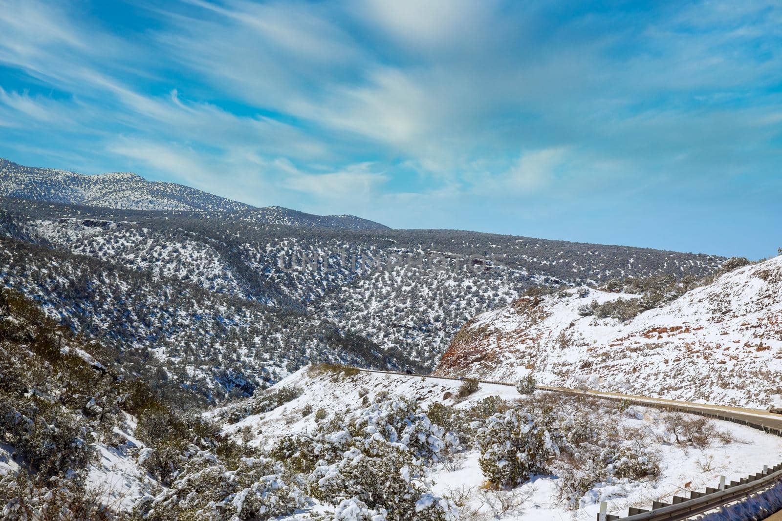 Snowy mountain panorama view in Arizona winter with snow clear blue sky by ungvar