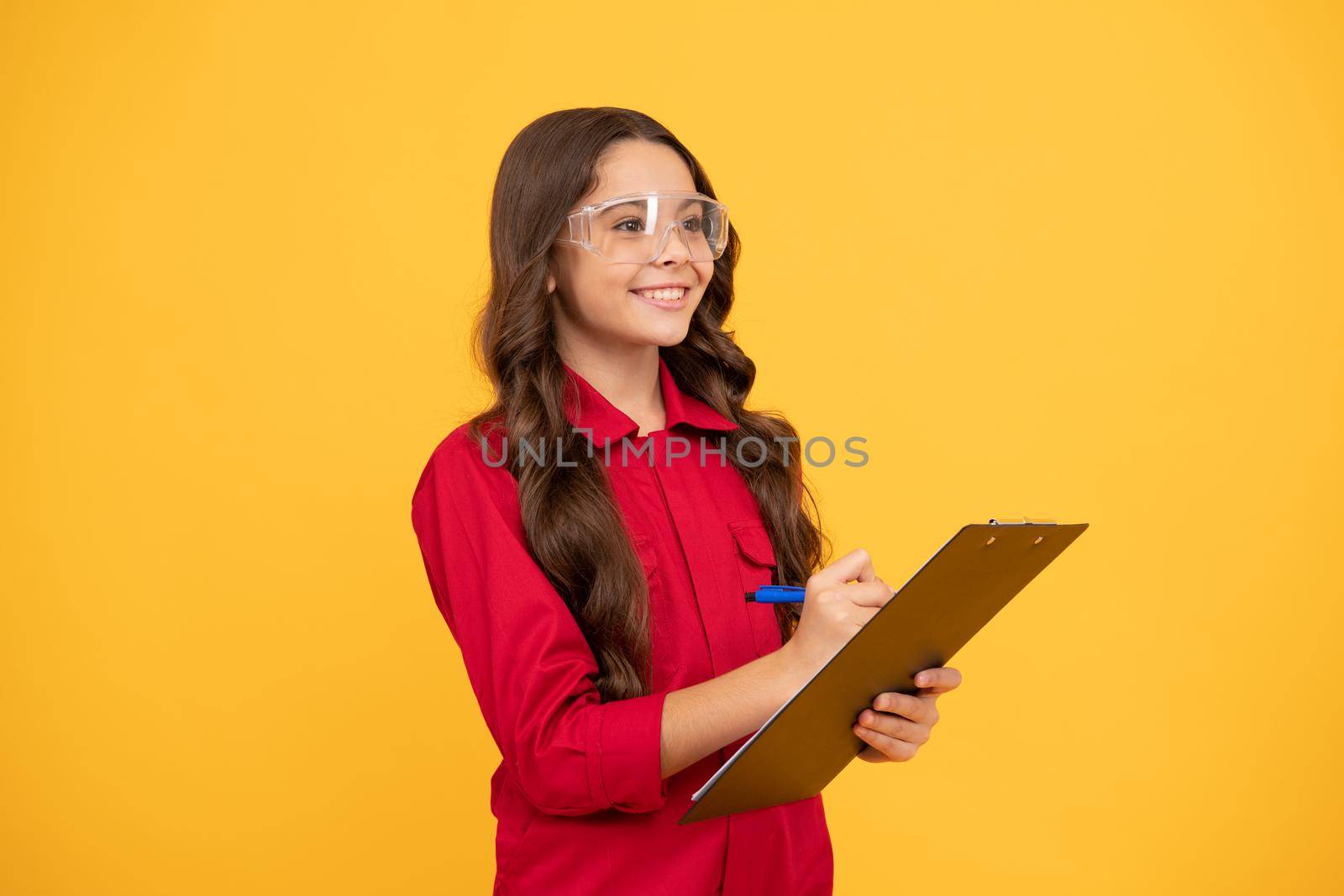 happy kid girl in eyeglasses hold paper folder, education.