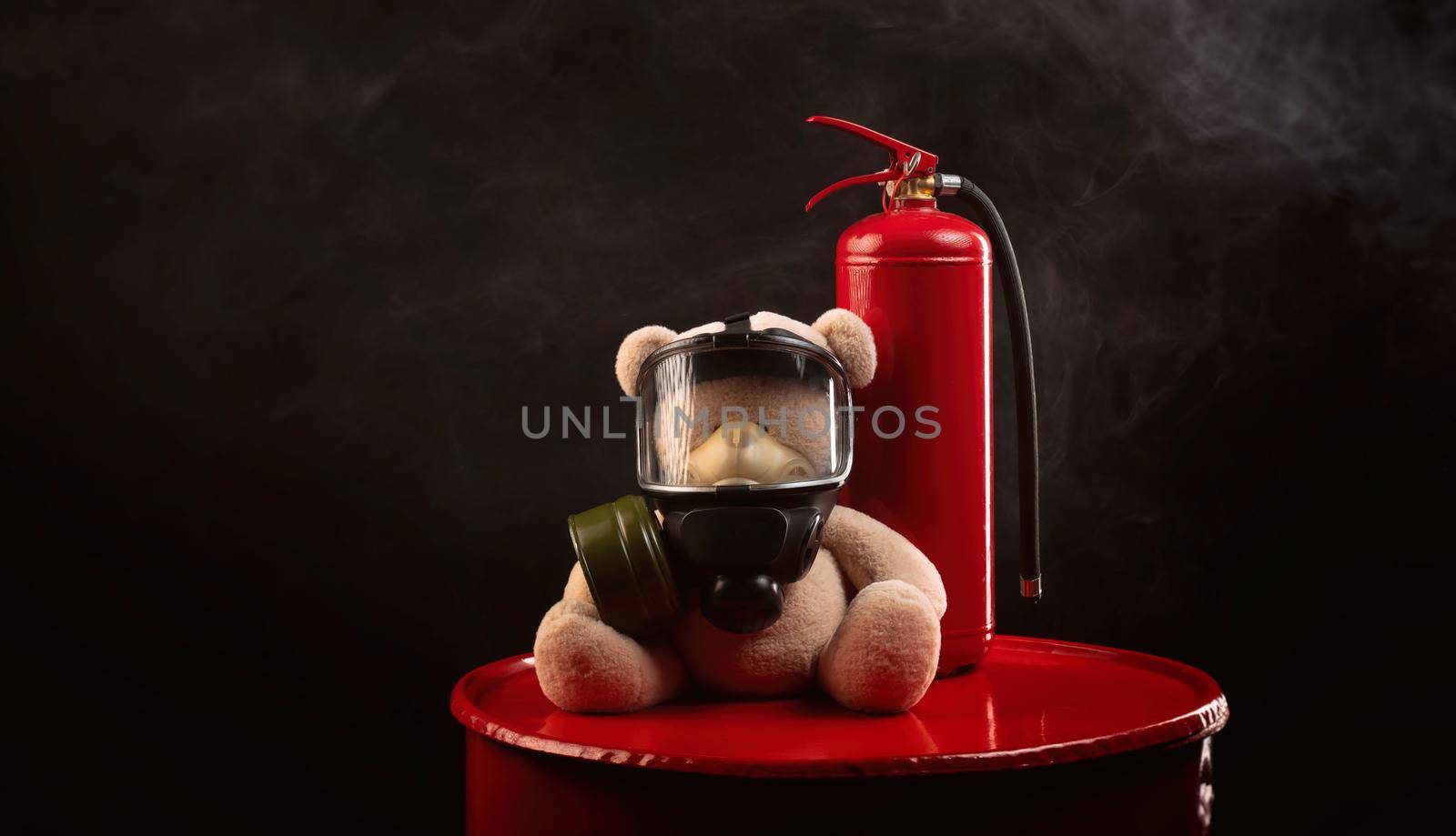 the mascot of the fire brigade is a teddy bear in a gas mask with a fire extinguisher in smoke on a dark background by Rotozey