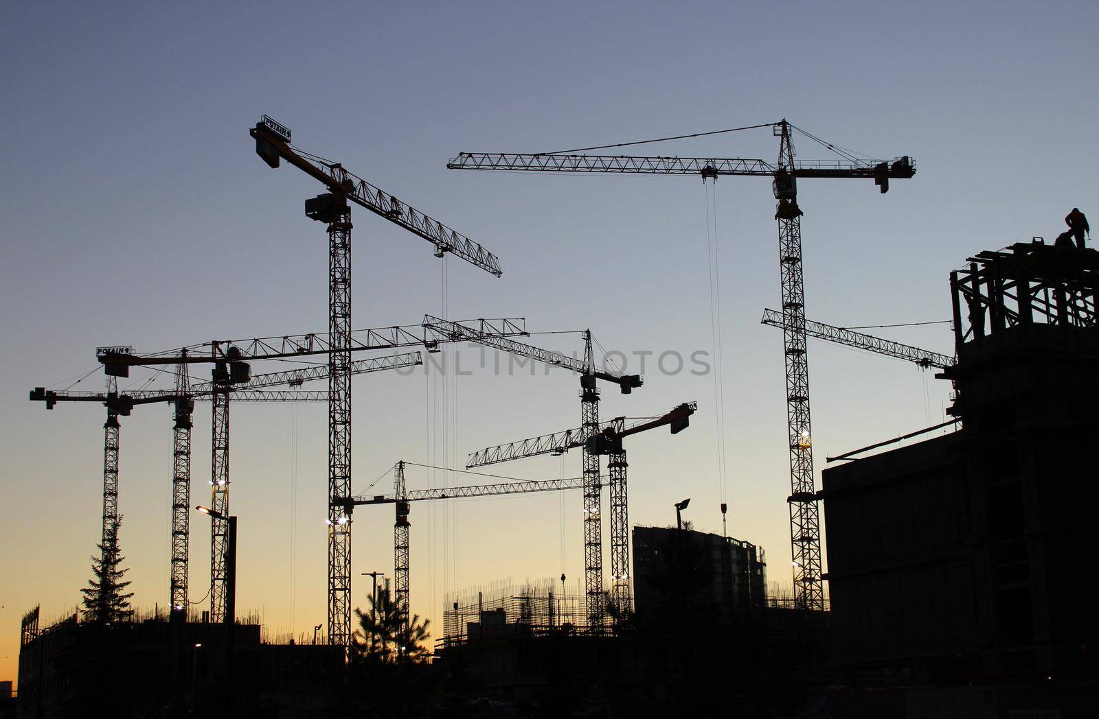 Tower cranes. Construction of a multi-storey residential complex ZILART. Moscow. Avtozavodskaya street. 11.17.2021. Multi-storey construction.