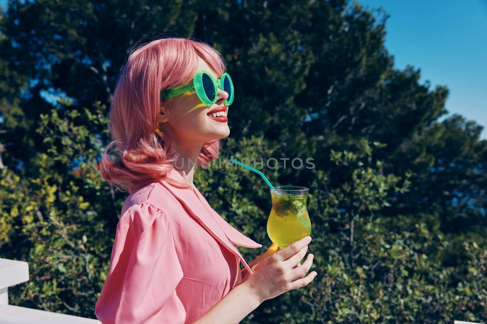portrait of beautiful woman happiness vacation sunny summer cocktail Drinking alcohol. High quality photo