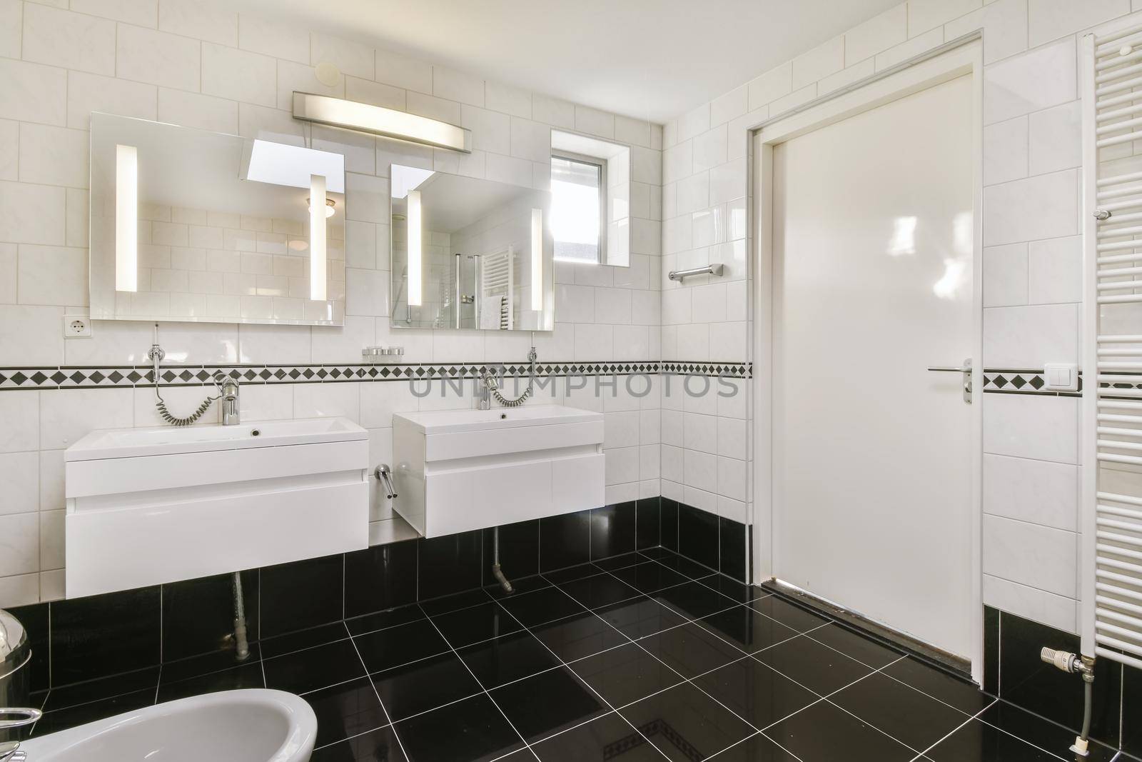 Beautiful bathroom with a bathtub and white walls