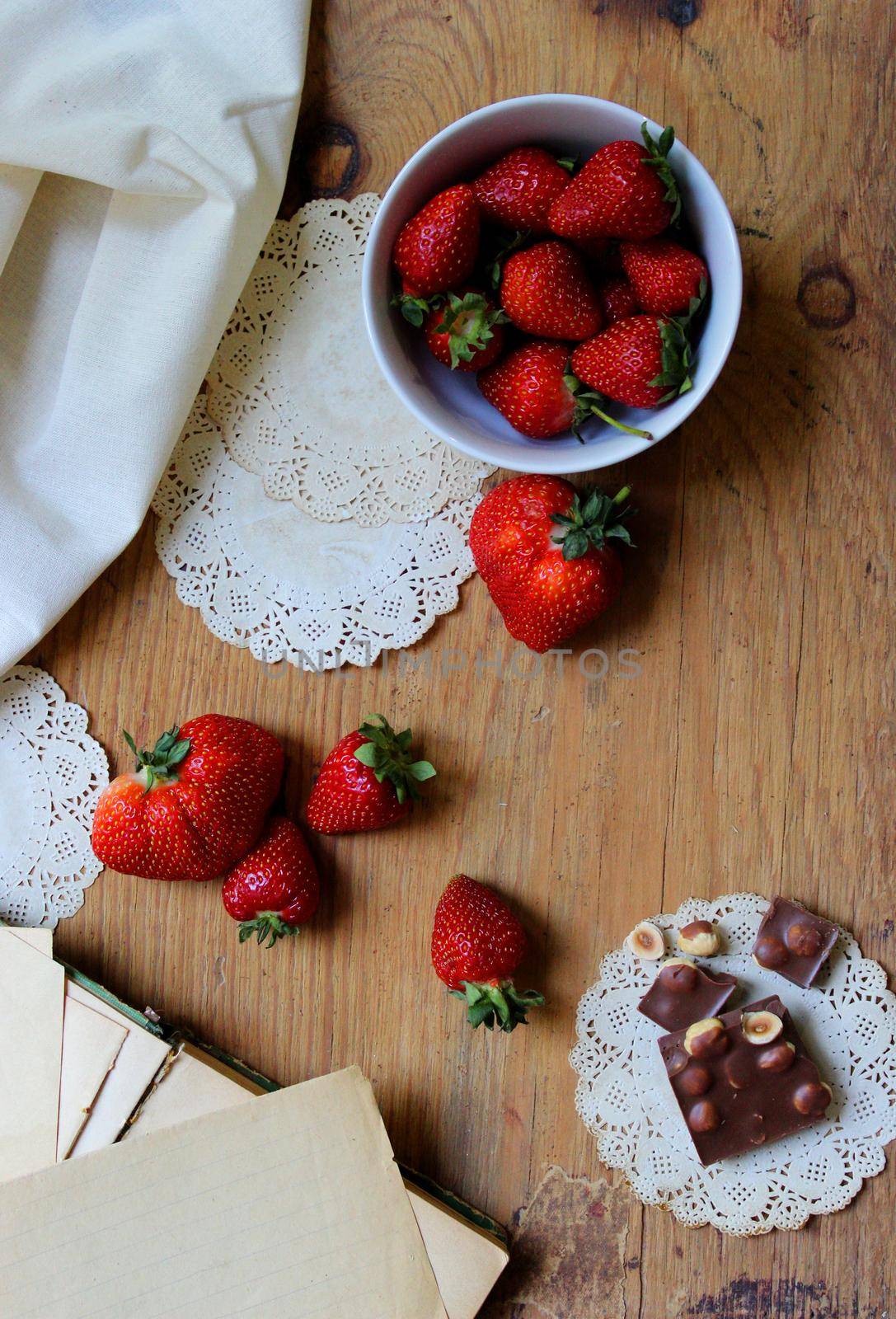 Strawberries and chocolate. Retro concept. Wooden background. Ready-made design for calendar and other purposes. Desktop wallpaper.