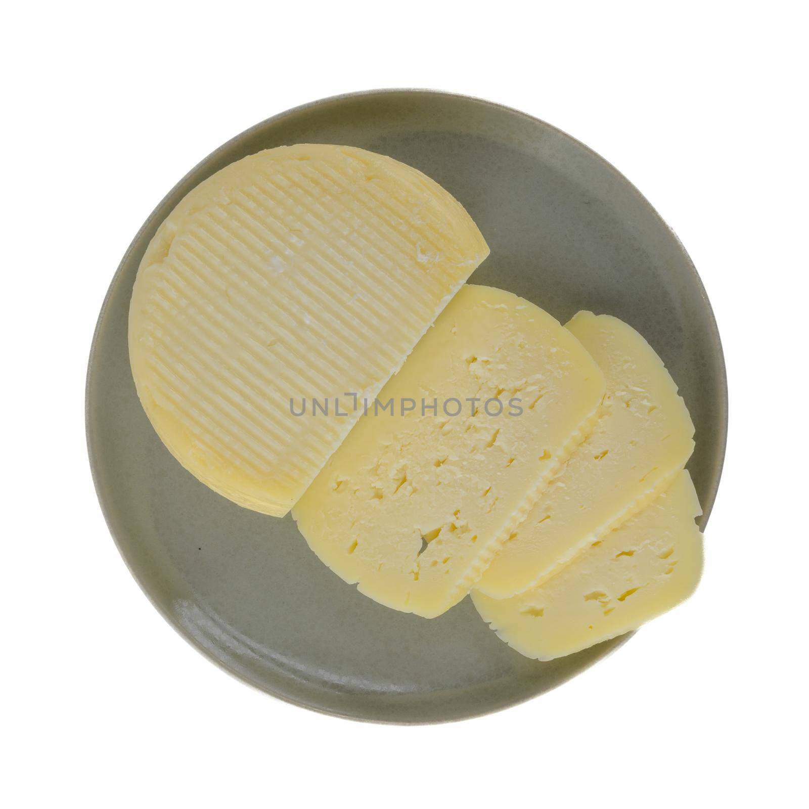 Round cheese on ceramic plate  by homydesign