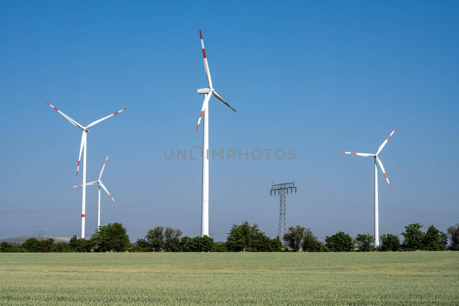 Wind turbines and an electric power line seen in Germany