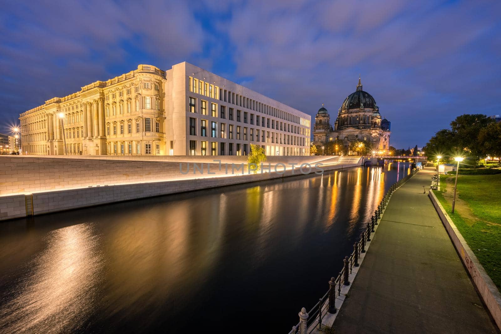 The Berlin Cathedral and the rebuilt City Palace on the banks of the Spree at dawn