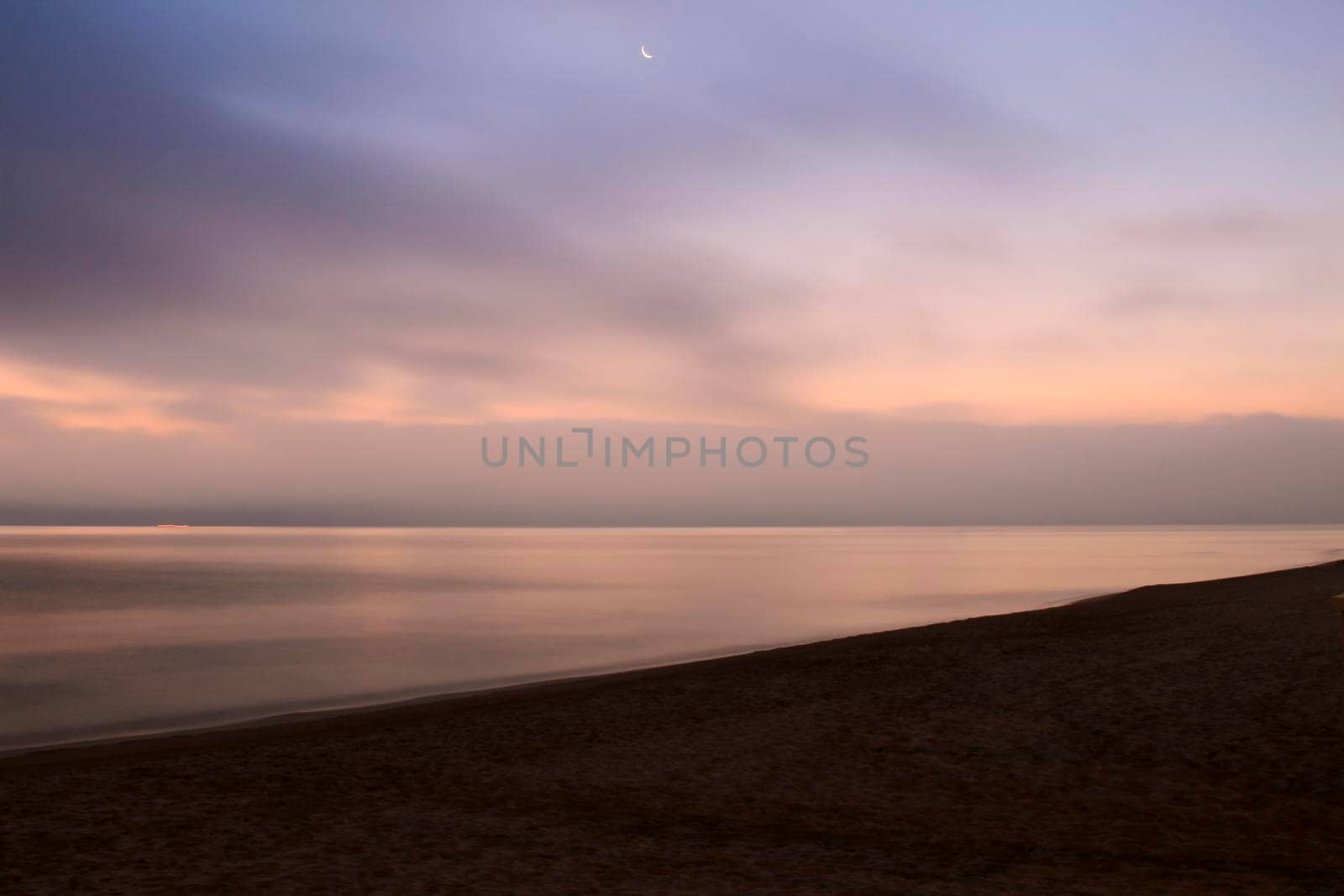 Beautiful Sunrise on the beach in winter in Arenales del Sol, Alicante,southern Spain