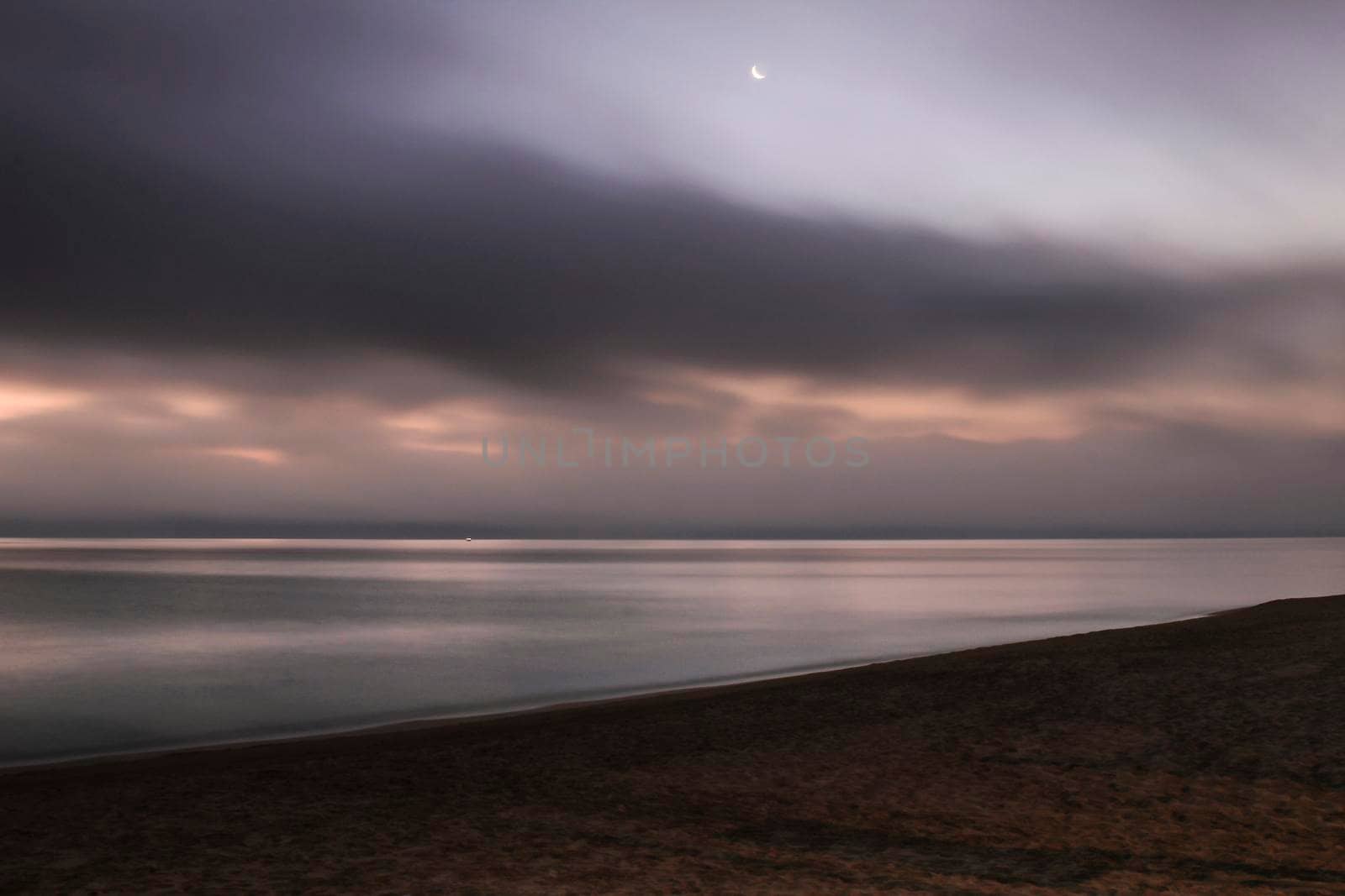 Beautiful Sunrise on the beach in winter in Arenales del Sol, Alicante,southern Spain
