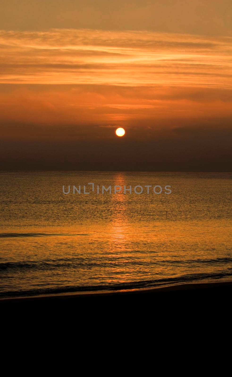 Beautiful Sunrise on the beach in winter in Arenales del Sol, Alicante,southern Spain