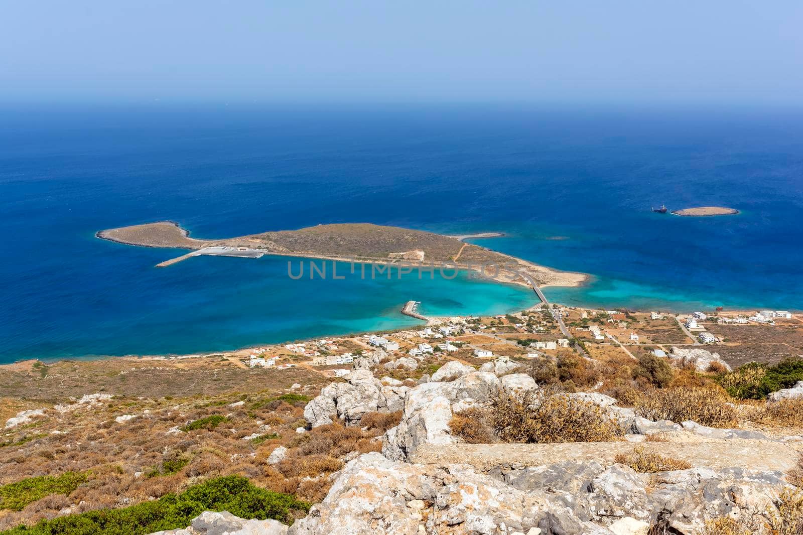 Diakofti port at the Greek island of Kythira. The shipwreck of the Russian boat Norland in a distance. by ankarb