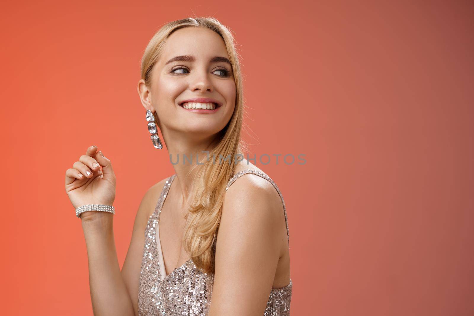 Elegant glamour gorgeous young rich blond woman attend charity party in stylish silver glittering dress accessorize turning right smiling greeting familiar person grinning joyfully, red background by Benzoix