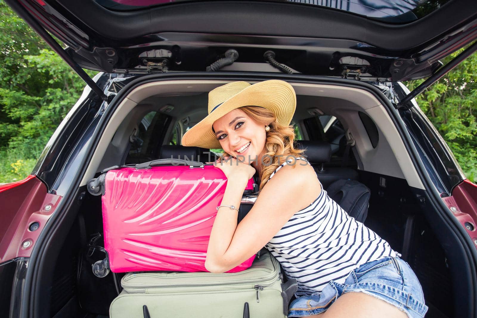 Woman on vacation. Summer holiday and car travel concept.