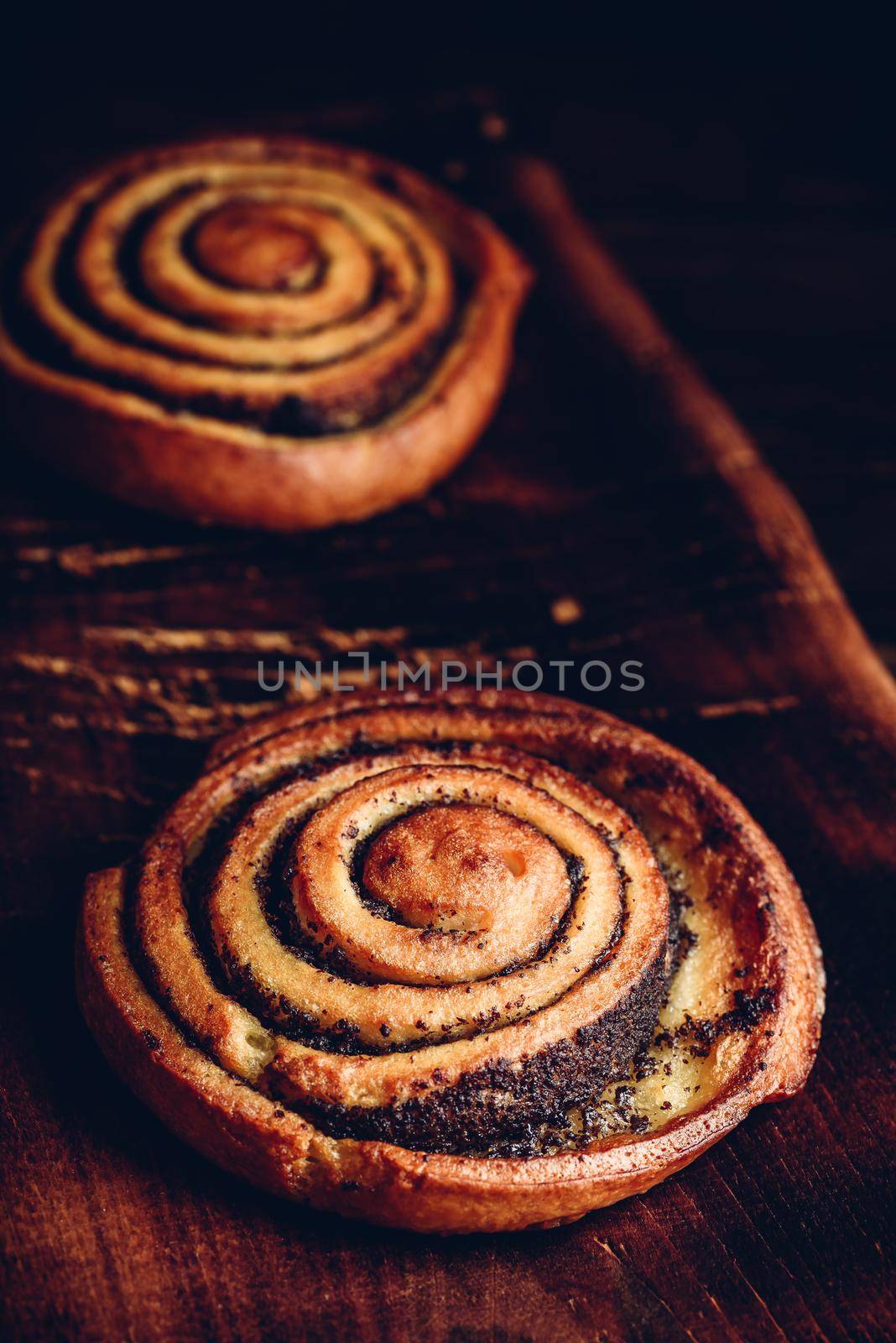 Sweet roll with poppy seeds by Seva_blsv