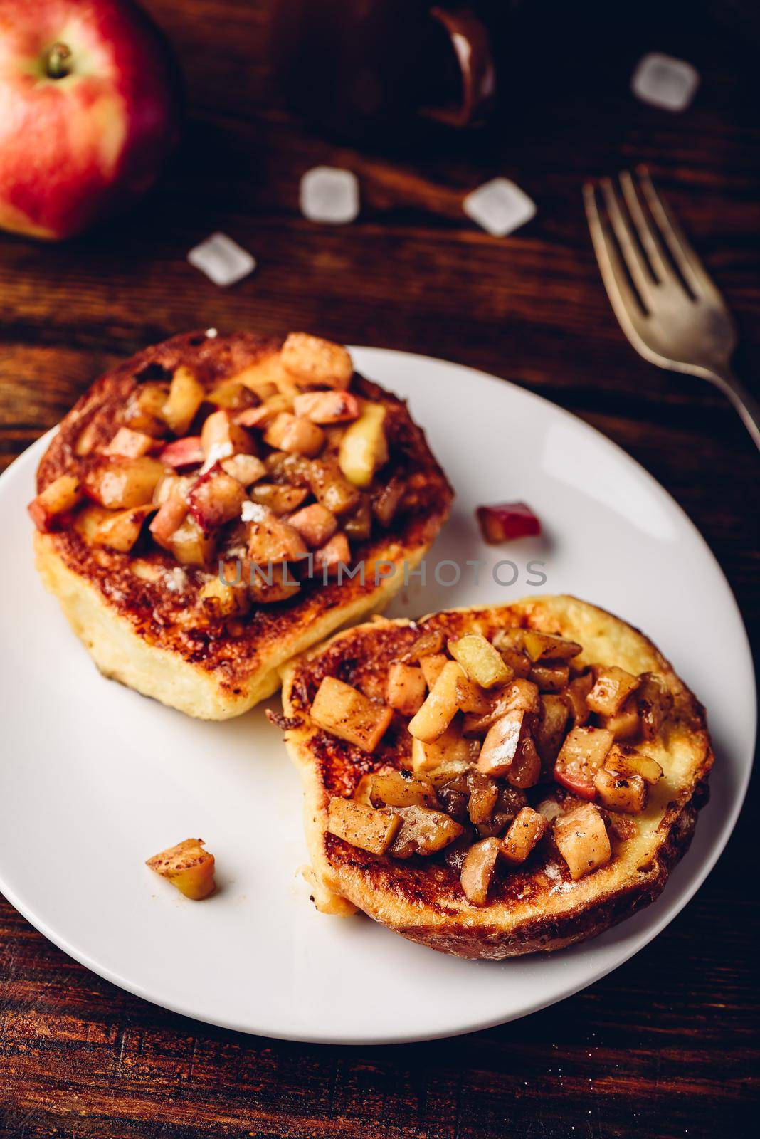 French toasts with chopped apple caramelized with cinnamon