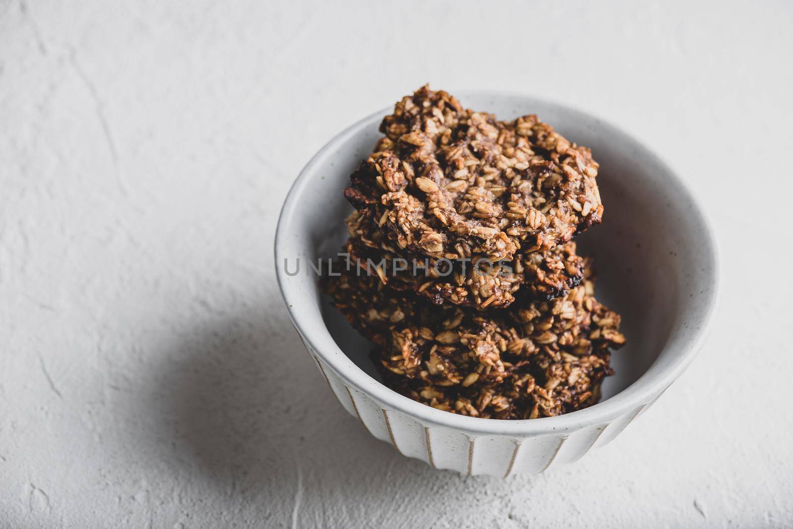 Banana oatmeal cookies with chocolate spread in bowl