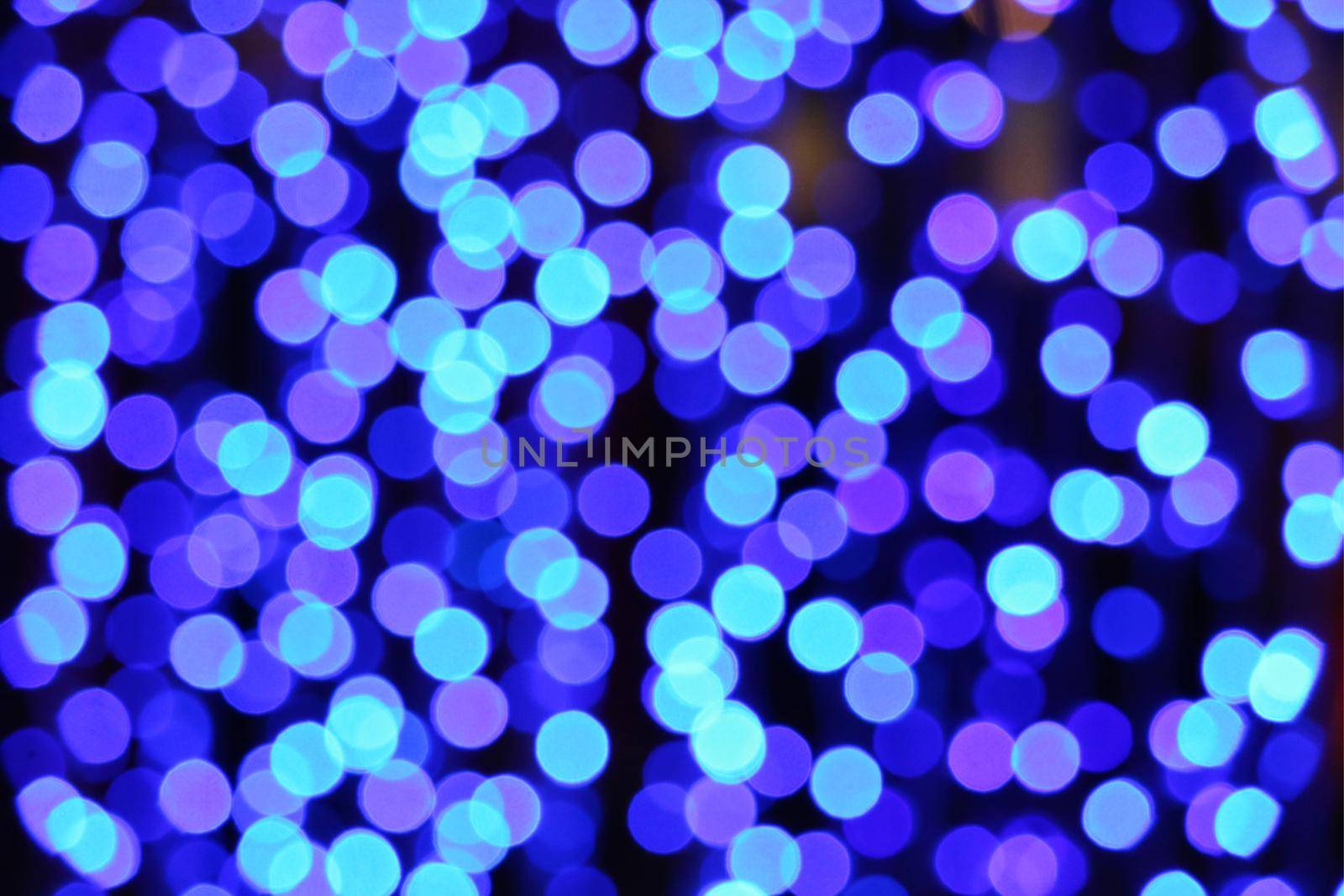 big aqua blue abstract of blur and bokeh glow interior and light night garden