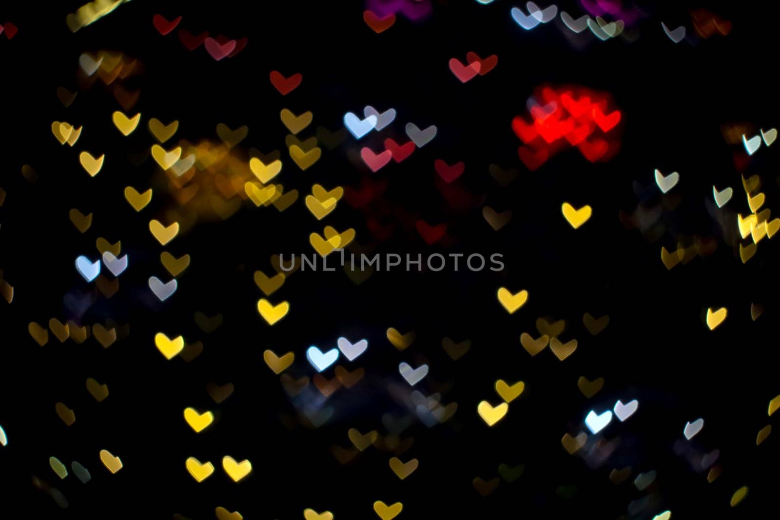 colorful abstract bokeh and blur heart shape love valentine night light by Darkfox