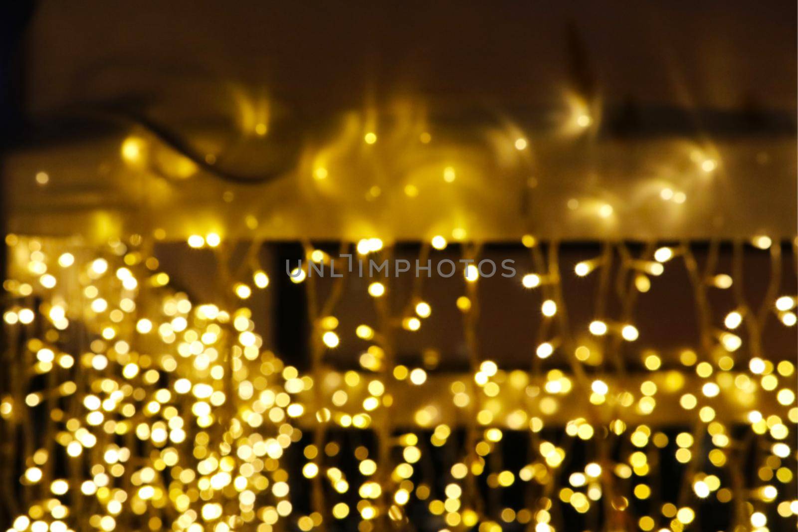 gold yellow abstract of blur and bokeh glow interior and light night garden and blur power electric line