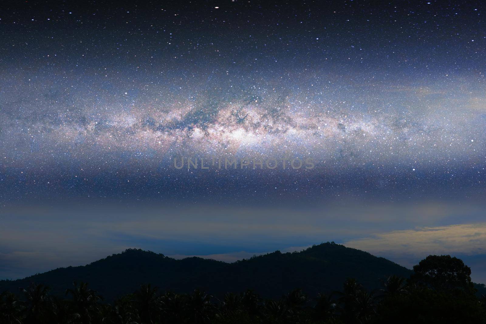 Milky way night landscape light over silhouette mountain, space and stars on sky background