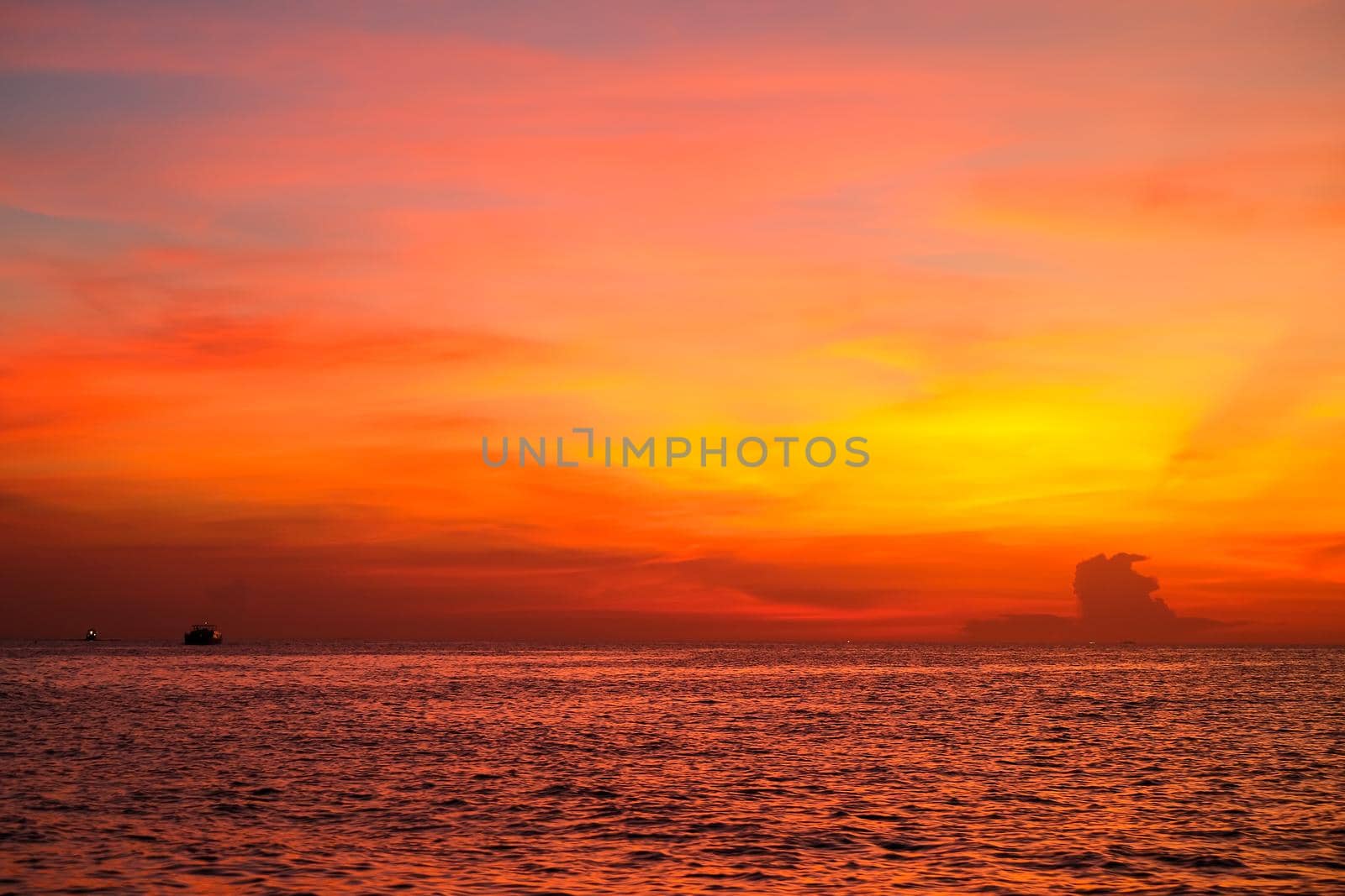 Red and orange sky during sunset on the sea and look beautiful landscape on holiday.