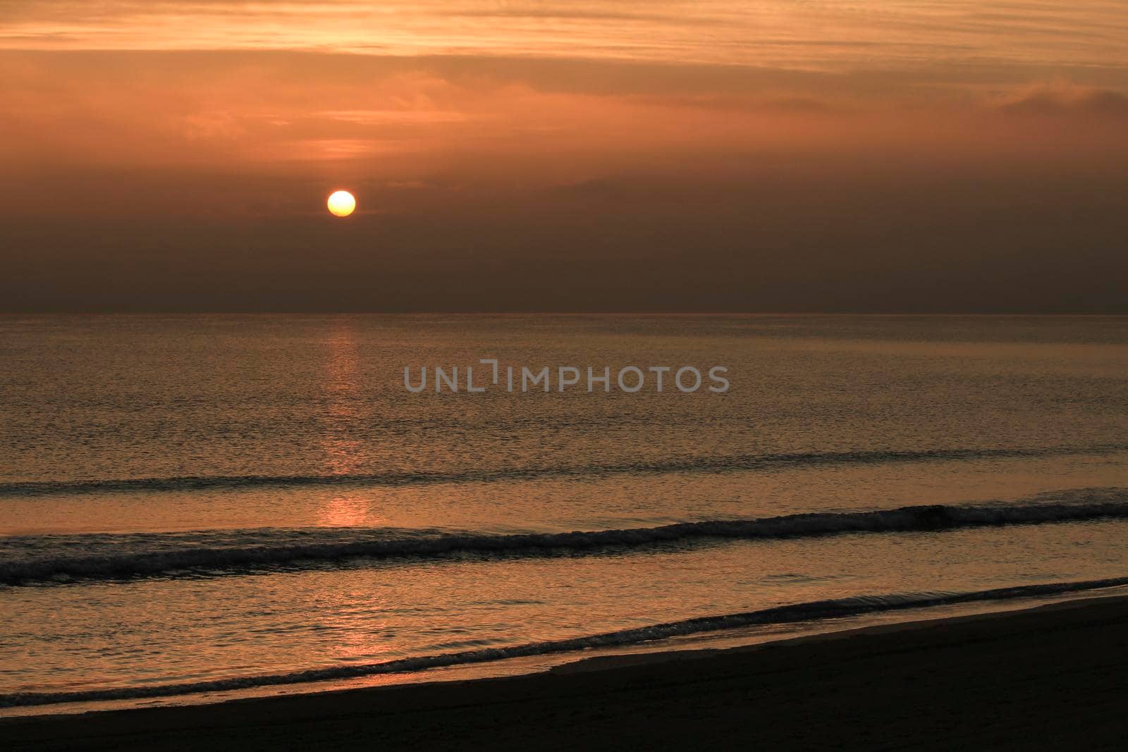 Beautiful Sunrise on the beach in winter in Arenales del Sol, Alicante,southern Spain