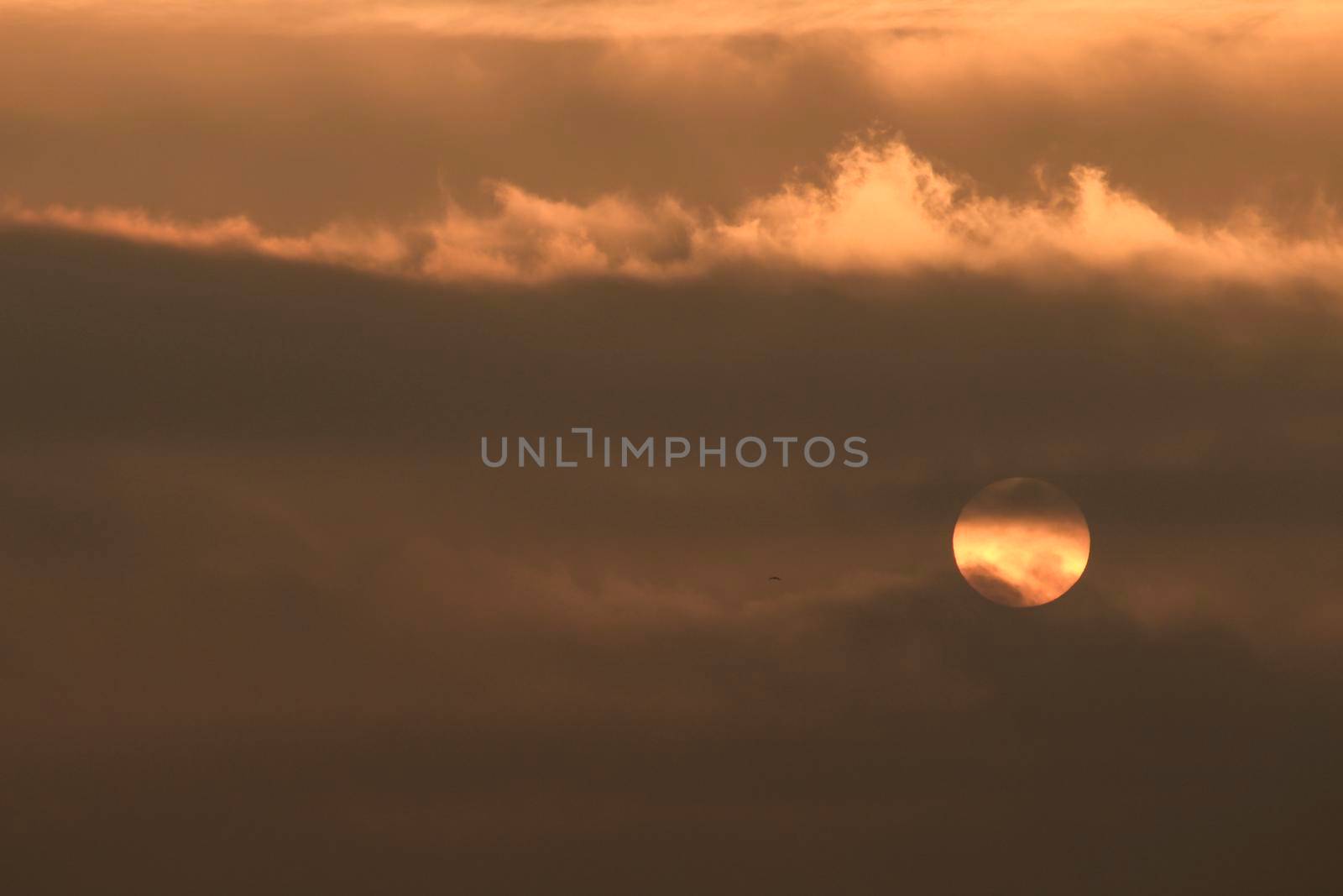 Colorful sun at sunrise over the mediterranean sea in southern Spain in Winter