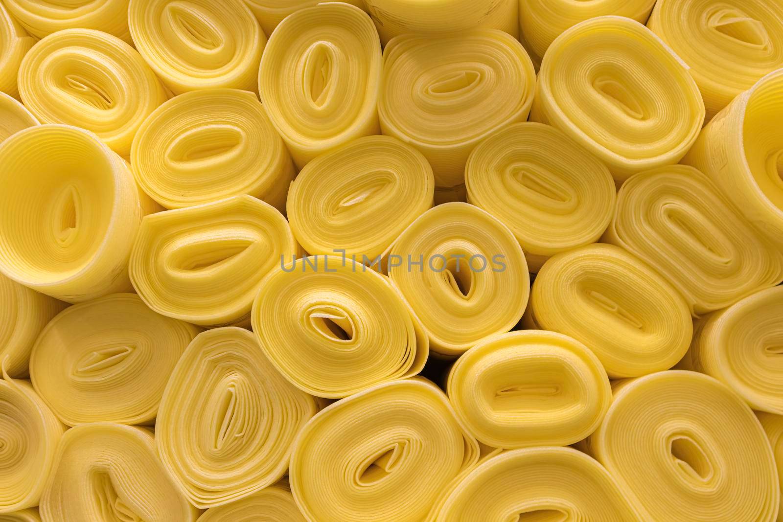 rolls of foam rubber on store shelves by roman112007