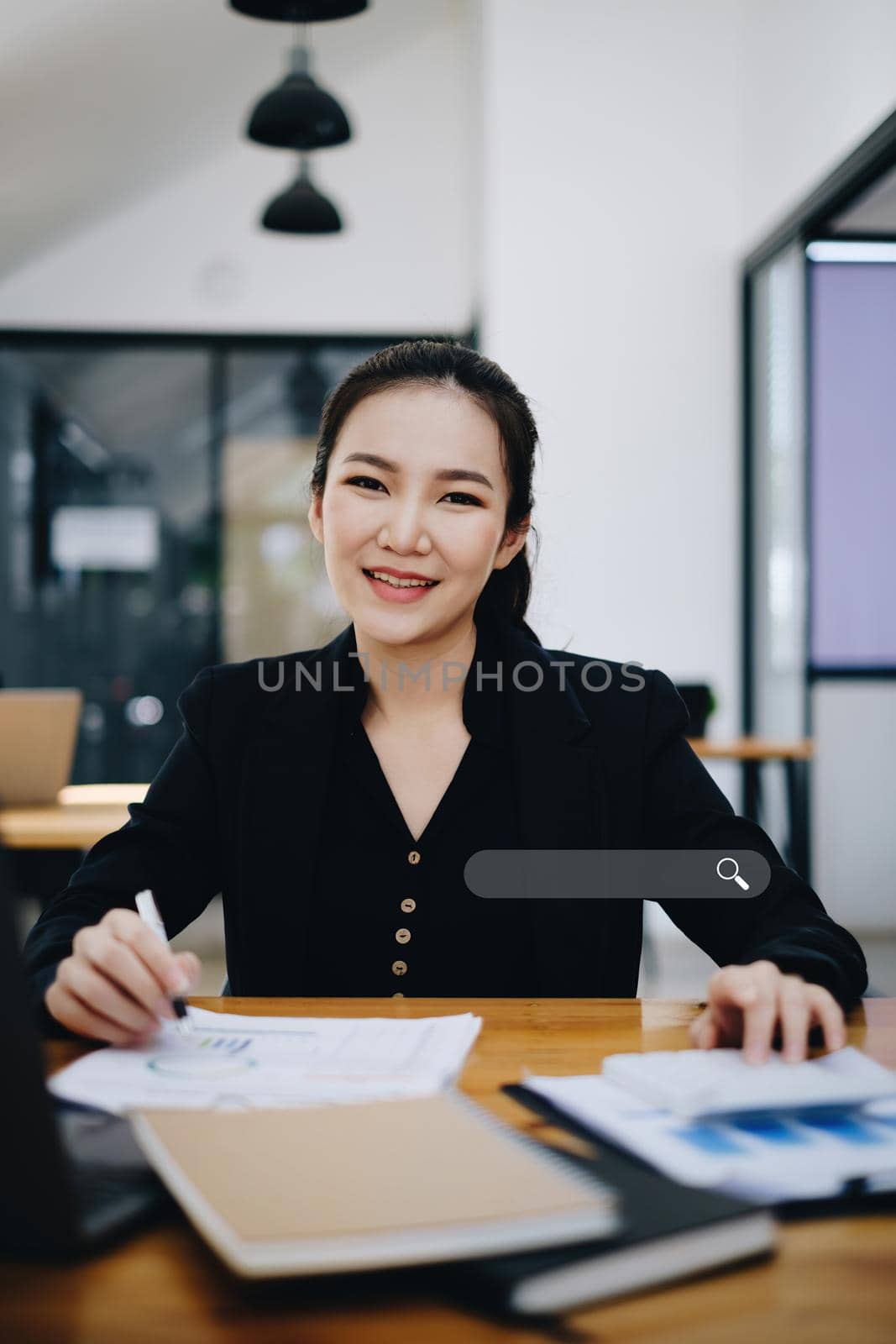Business woman analyst financial advisor preparing statistical report searching documents on work desk, browsing information online by laptop computer