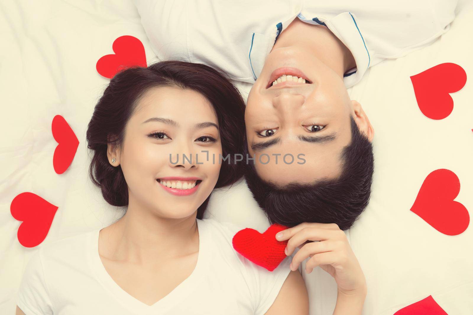 Couple of asian lovers at the beginning of love story having fun together.