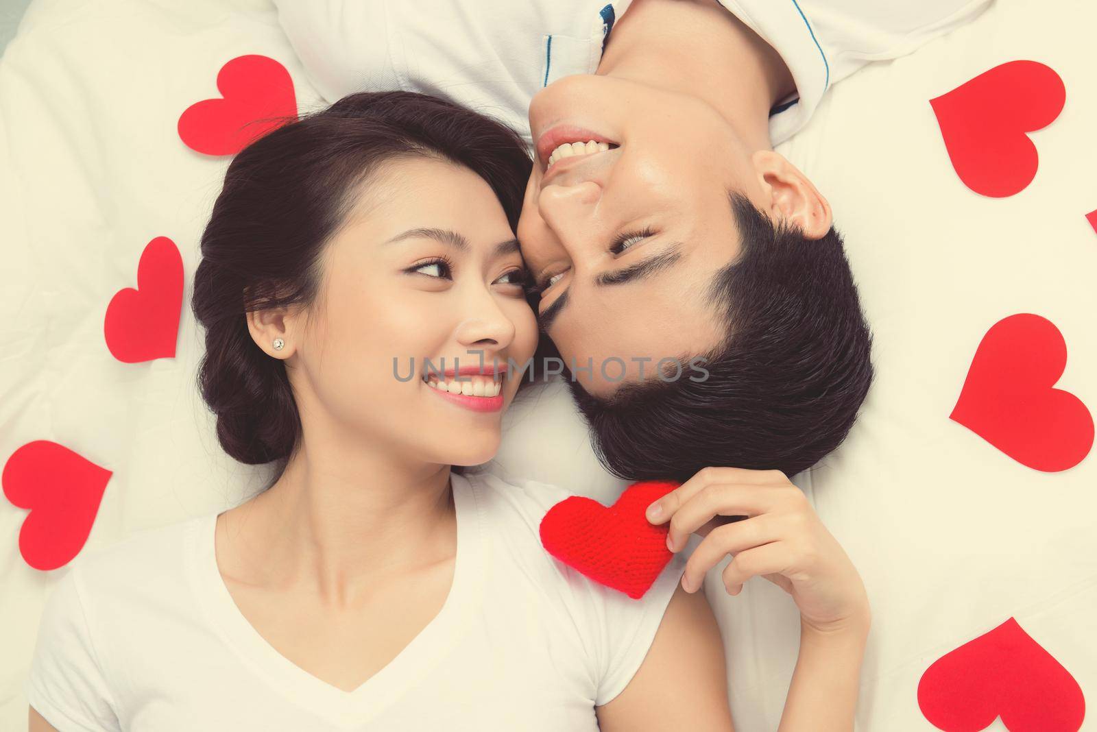Couple of asian lovers at the beginning of love story having fun together.