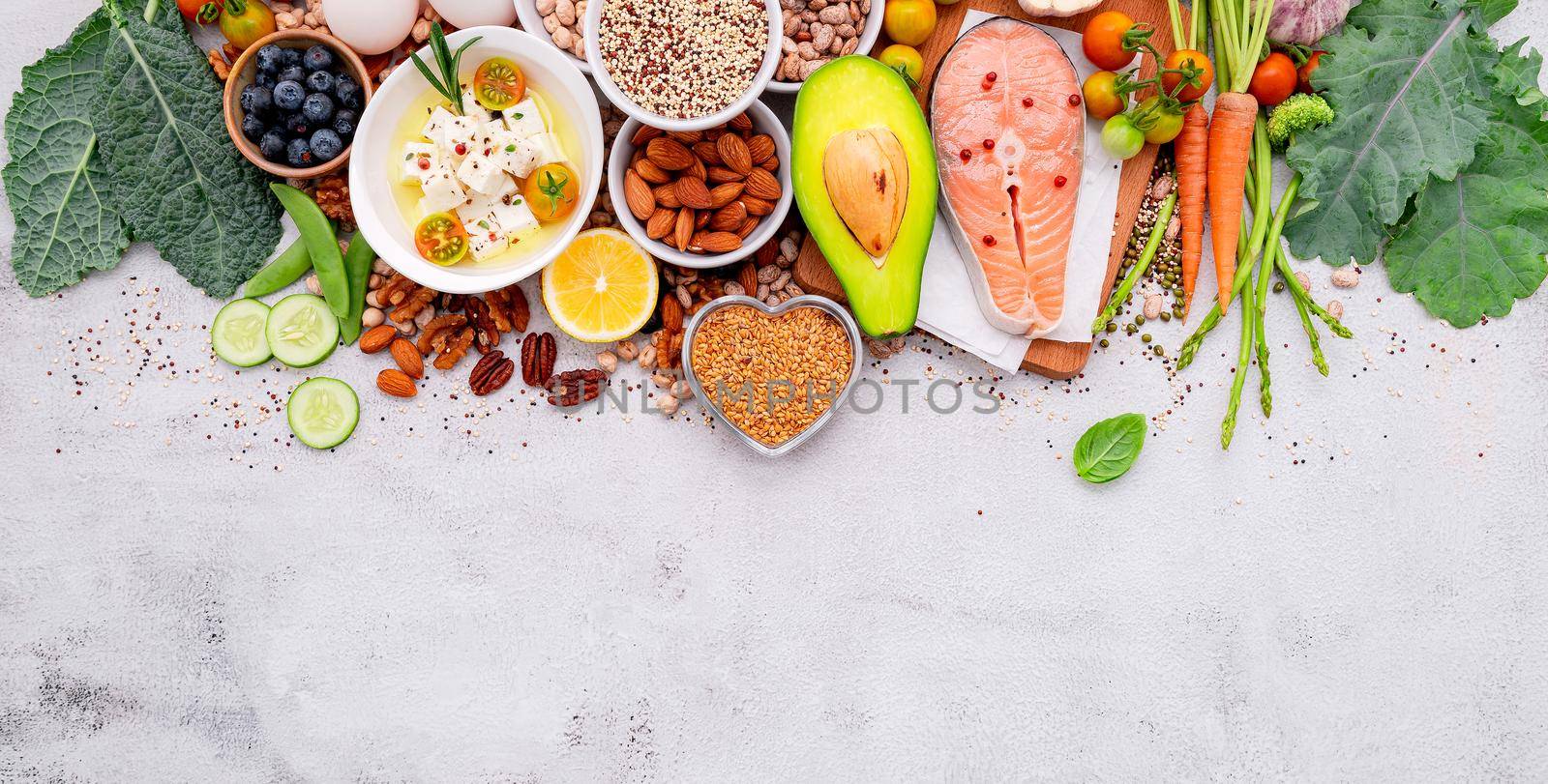 Ketogenic low carbs diet concept. Ingredients for healthy foods selection set up on white concrete background.