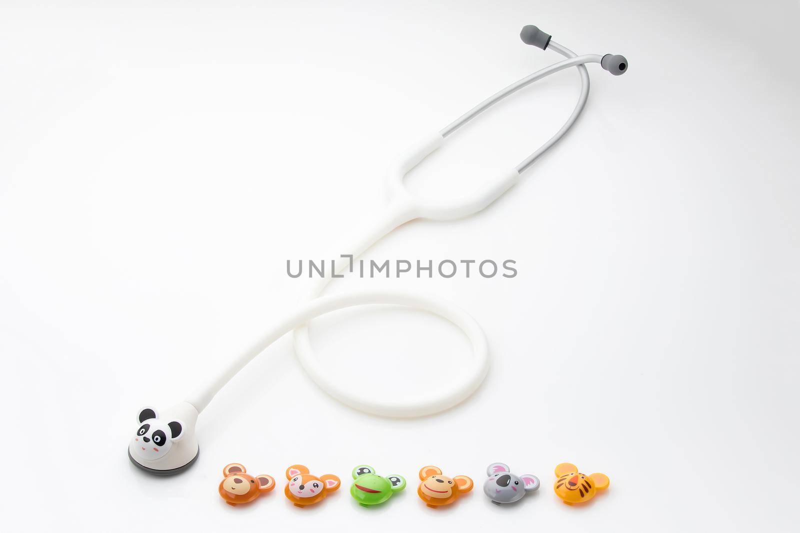 Pediatric stethoscope with interchangeable animal heads on a white background