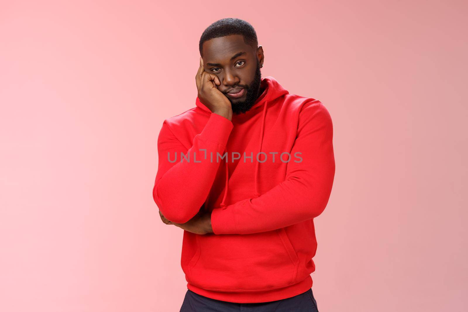 Bored annoyed african-american guy look sceptical dying boredom cannot wait go home lean head palm raise eyebrow judgemental ignorant, standing bothered irritated pink background by Benzoix