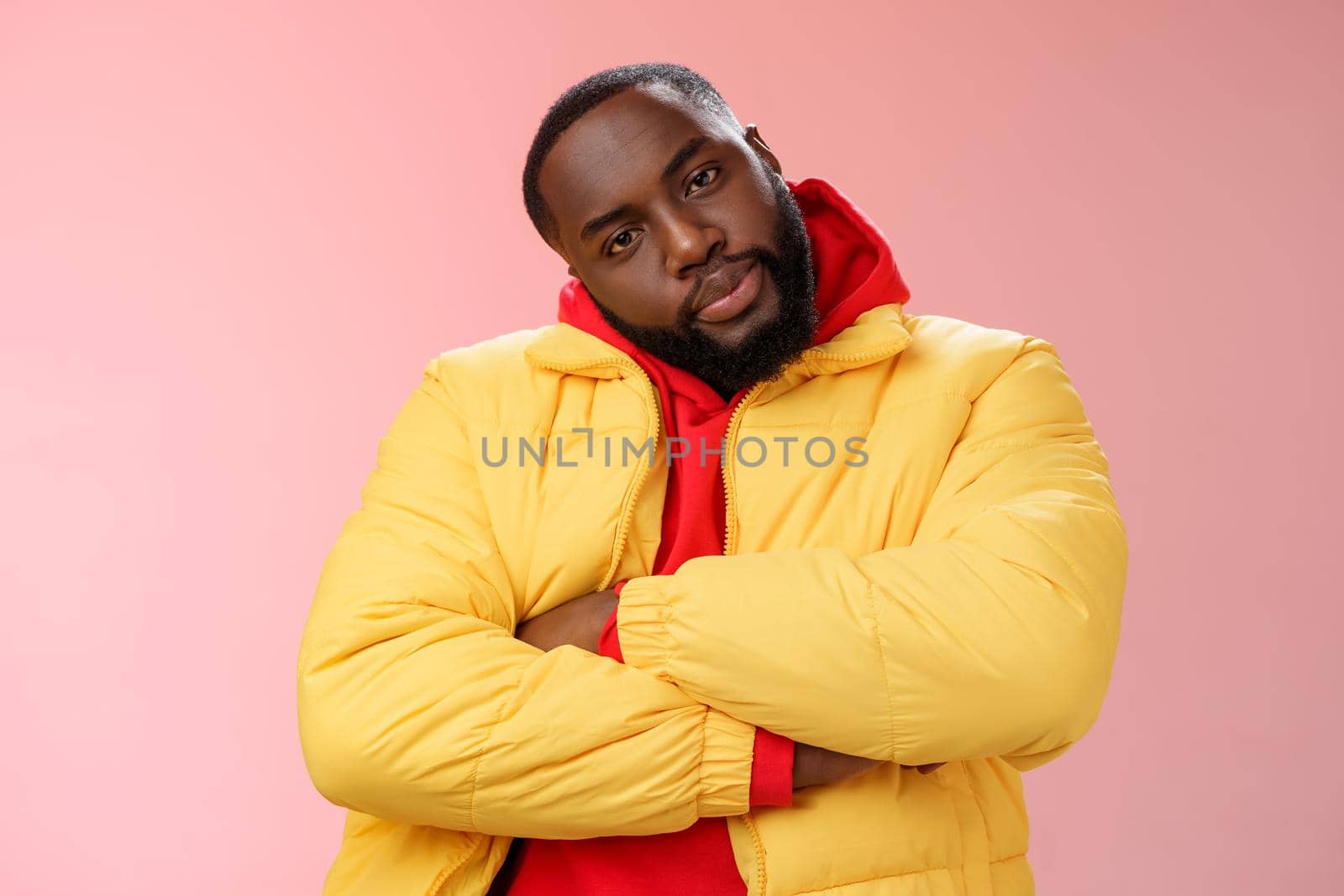 Show me whatcha got. Portrait cool stylish serious-looking urban black bearded guy in trendy yellow hoodie cross arms over chest tilting head wanna see what prepared rival standing confident by Benzoix