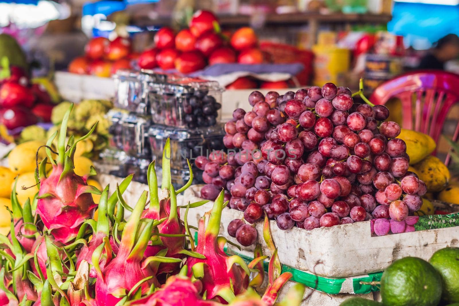 Variety of fruits on the Vietnamese market. Asian cuisine concept.