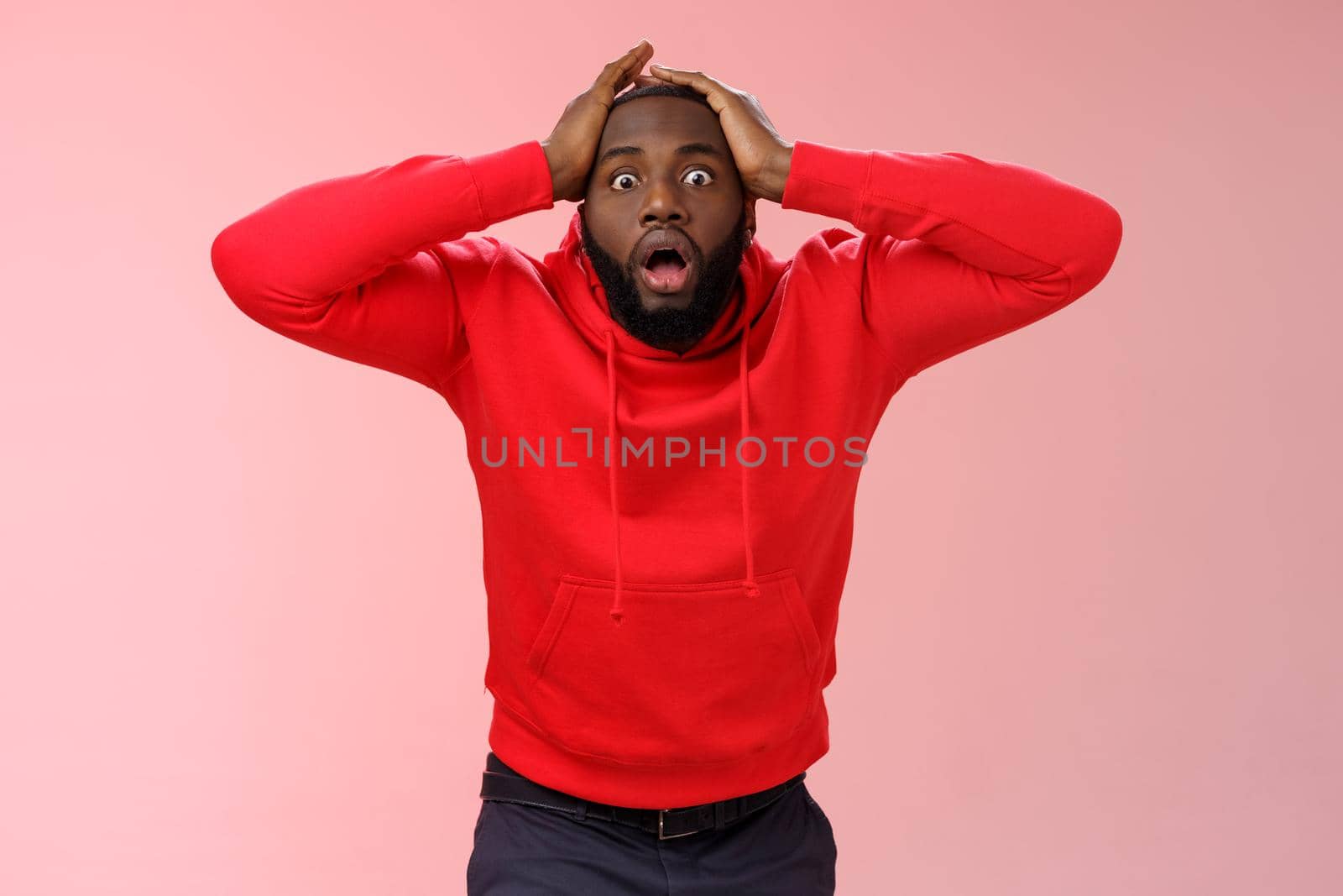 Impressed concerned black guy standing stupor worried grab head shocked gasping open mouth worry friend hurt look camera intense panic, standing pink background troubled see unbelievable by Benzoix