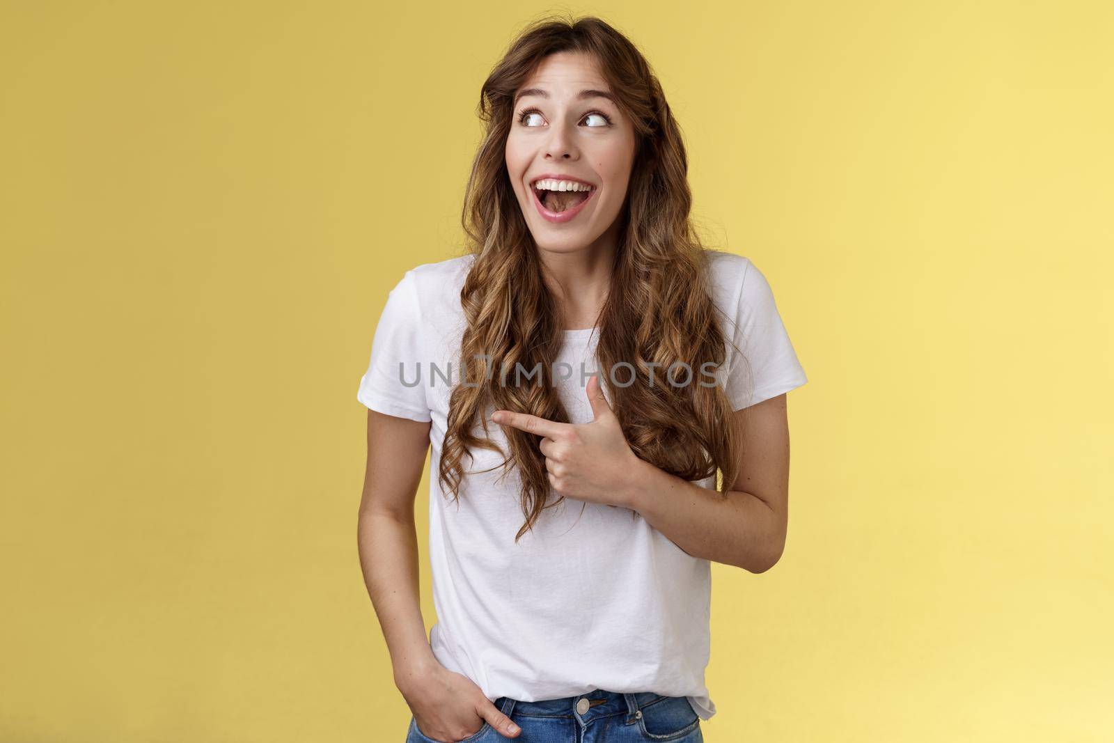 Funny amused cute girlfriend enjoy awesome party having wonderful time spend amazing day city fair open mouth surprised fascinated observe admiration lgbtq pride parade happy yellow background by Benzoix