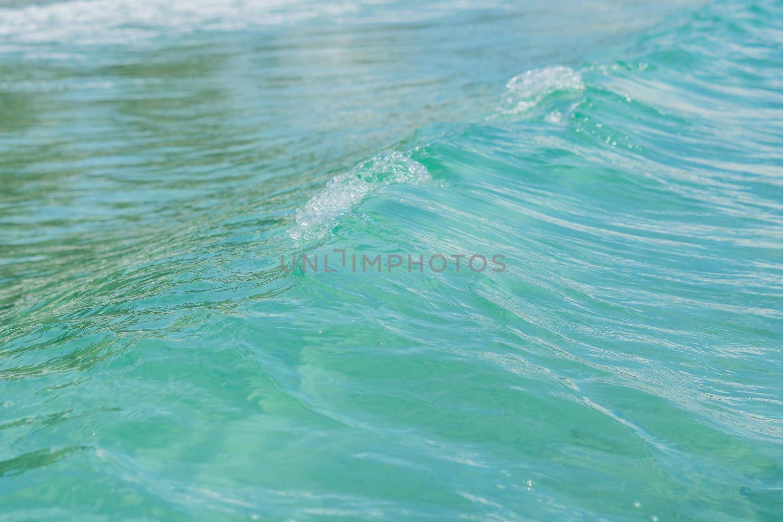 background blue tropical sea water ripples. wave