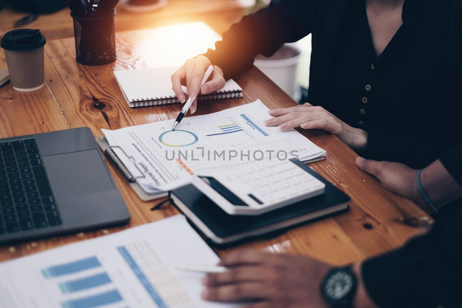 Business woman or accountant making working audit with her team. finance and accounting concept