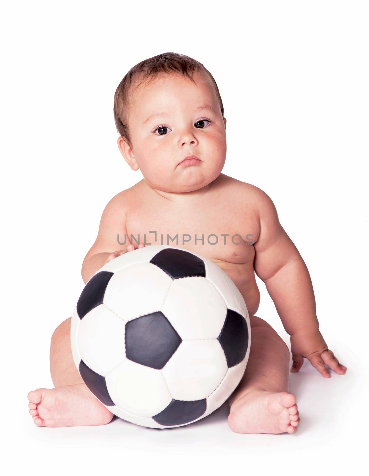 Baby playing with soccer ball. All on white background