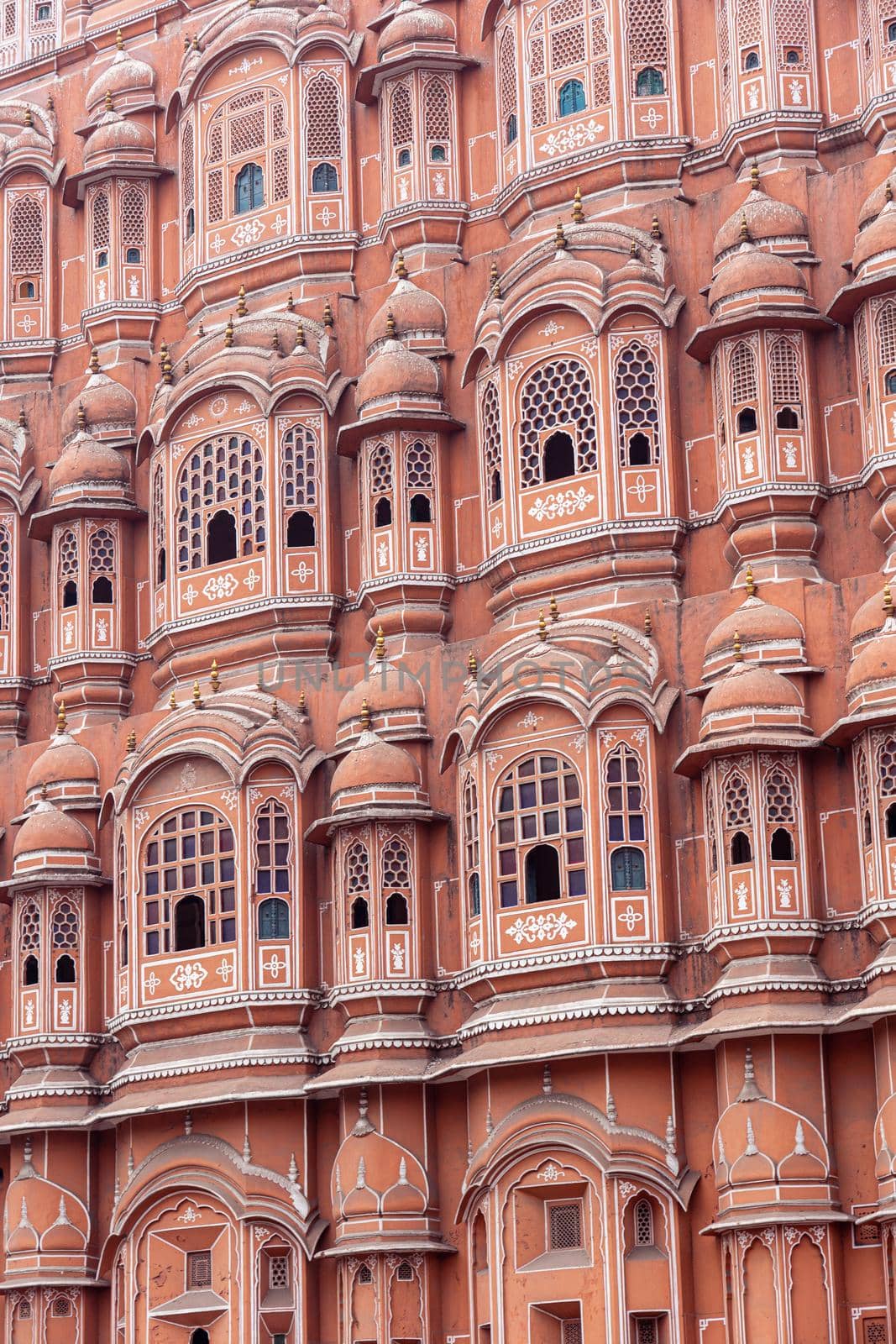 Jaipur, India - December 11, 2019: Beautiful windows of the Hawa Mahal, Palace of Winds in the pink city.