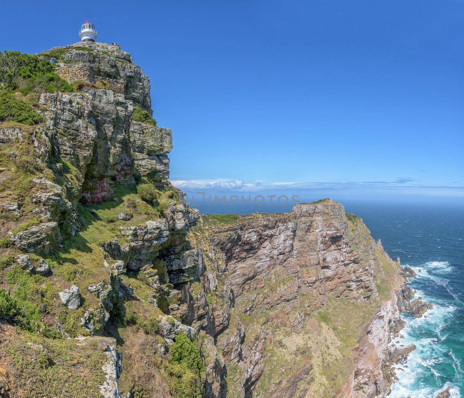 The old lighthouse, top, left and the new lighthouse to the right, down below, at Cape Point