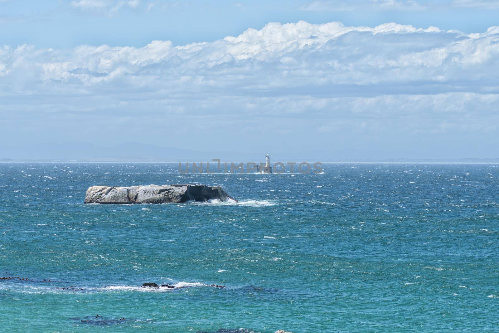 Noahs Ark Rock in Simonstown with Roman Rock Lighthouse visible in the back