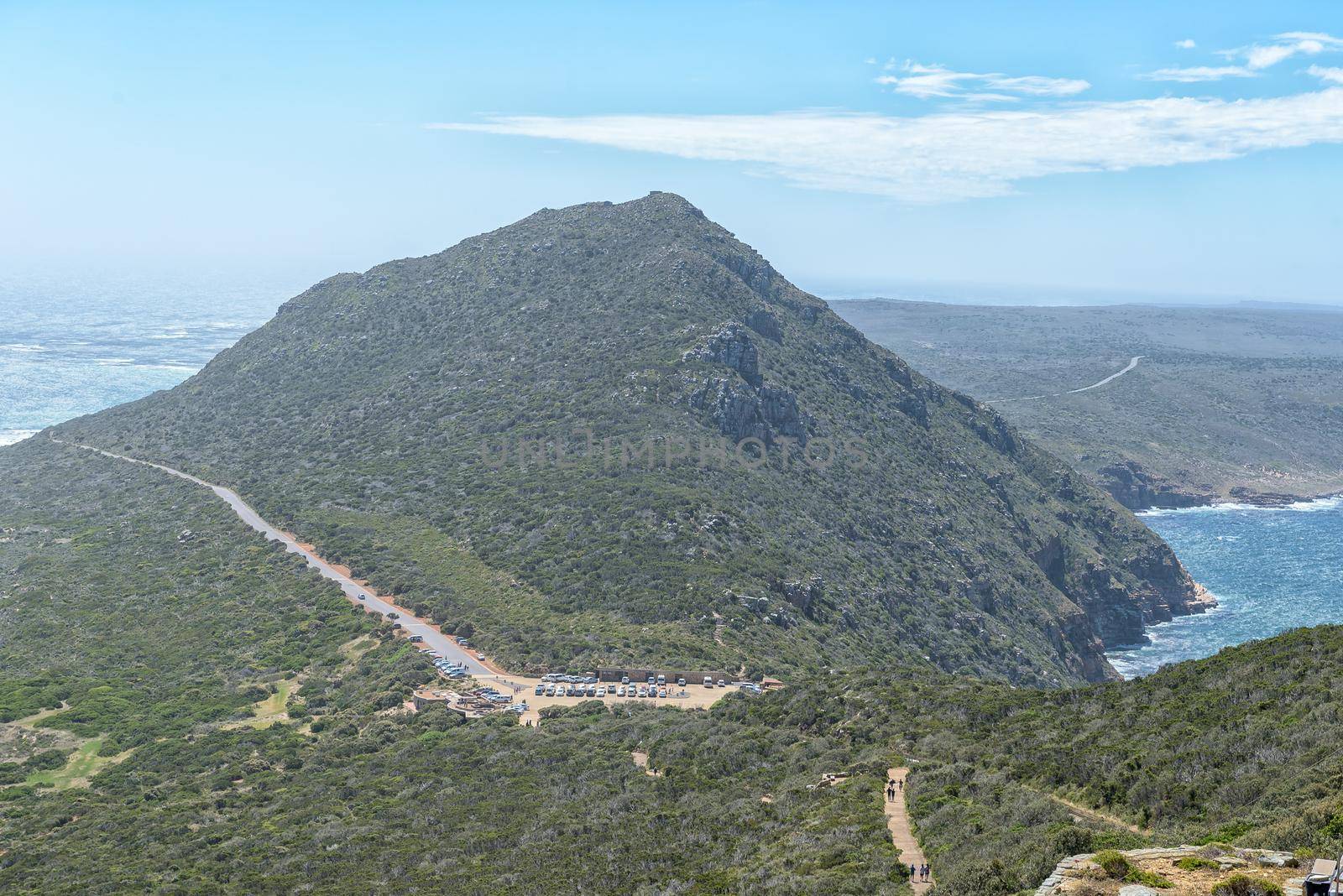 The parking area as seen from Cape Point. Vehicles and people are visible