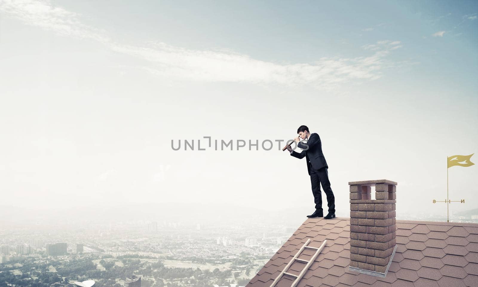Young determined businessman standing on house roof and looking in spyglass. Mixed media