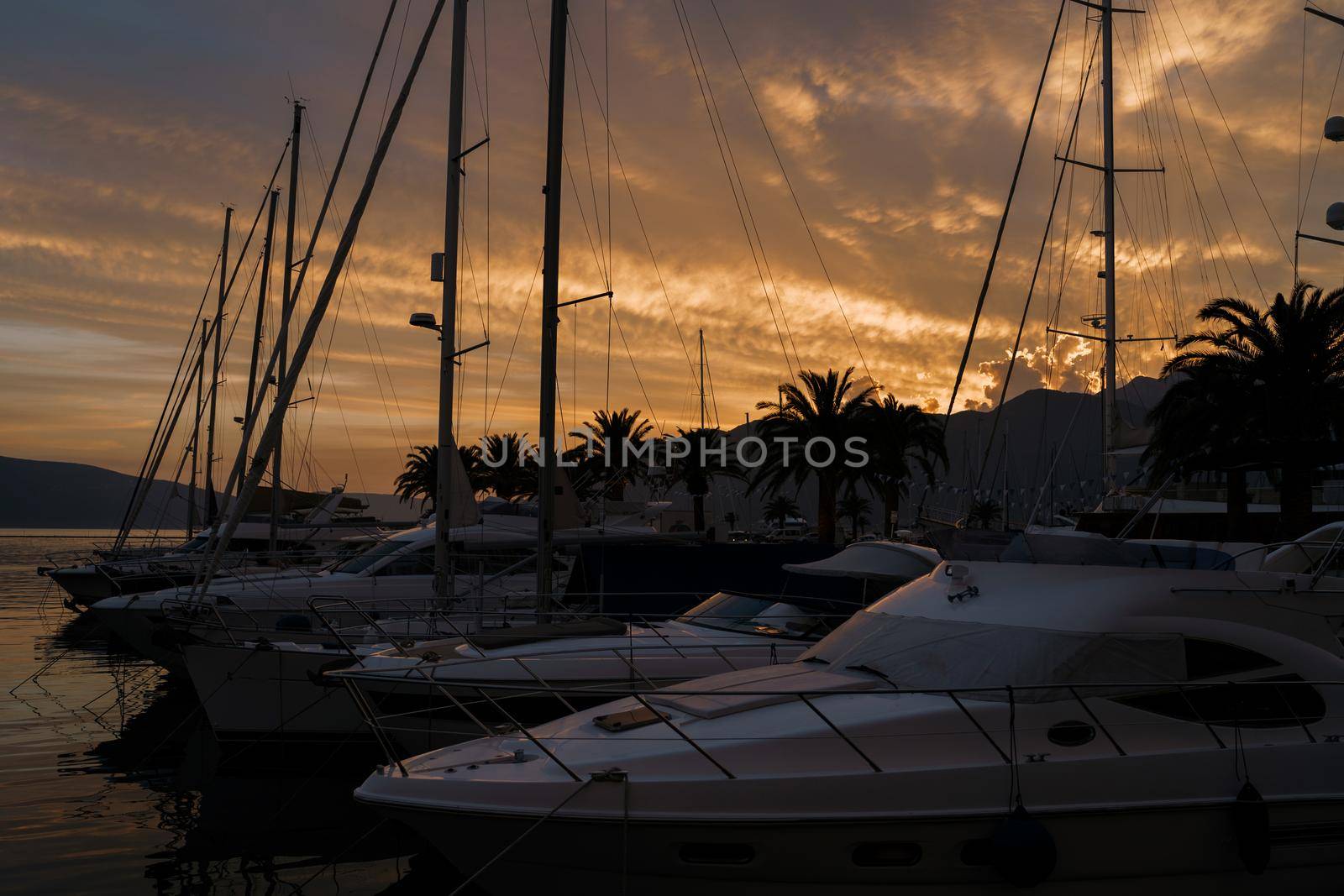 Twilight over the mountains and the marina in Porto. High quality photo