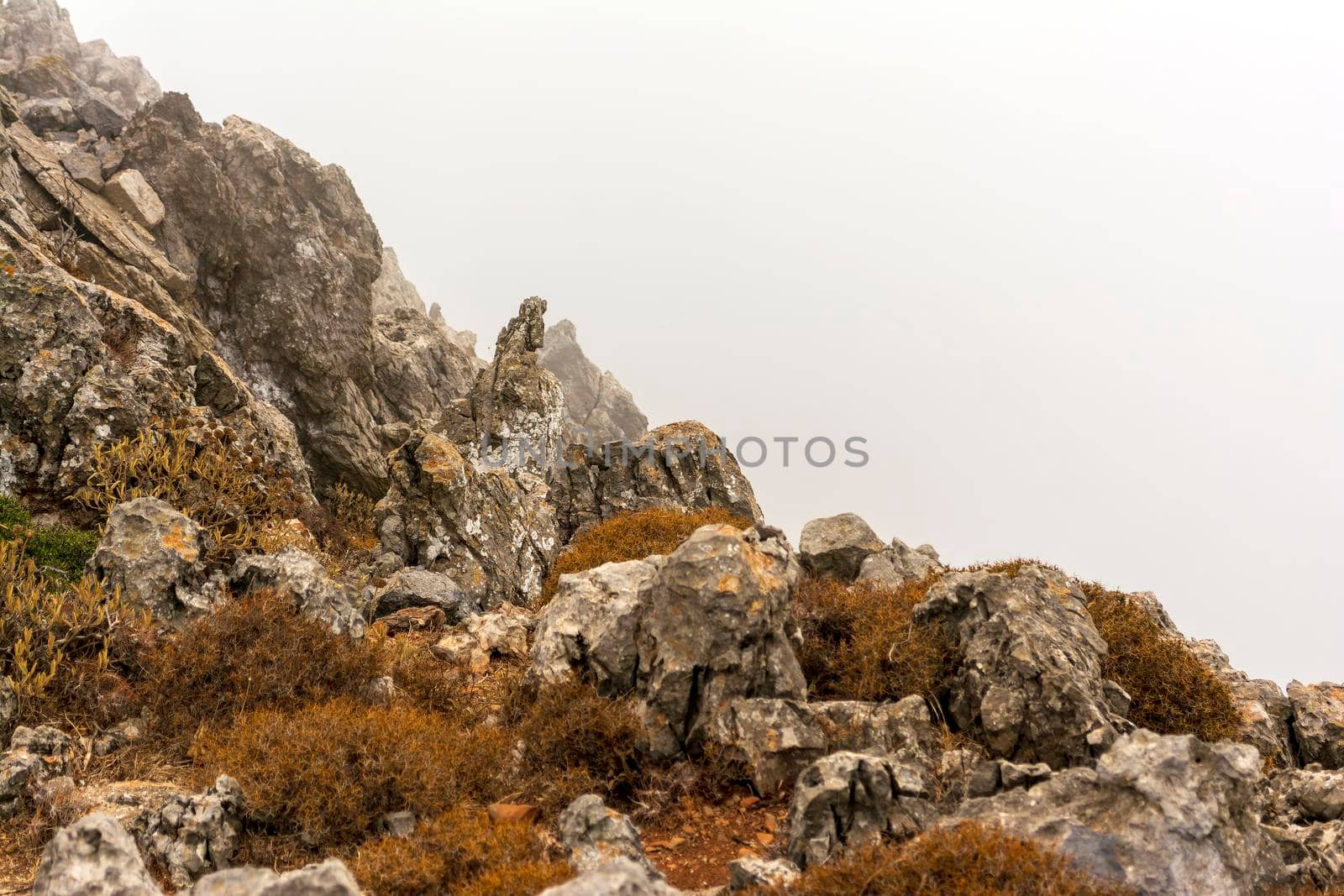 Fog over high mountain peak, Kythira, Greece.
