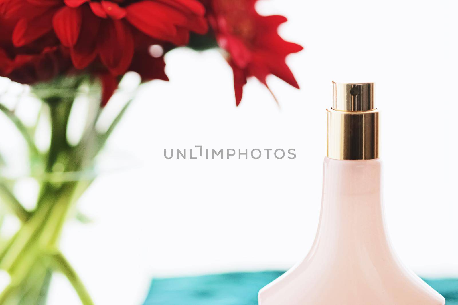 Vintage pink and gold perfume bottle, beauty and cosmetics concept