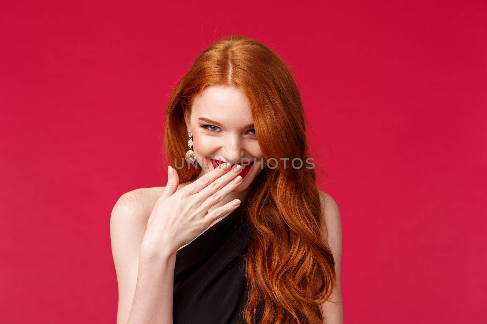 Close-up portrait of gorgeous silly and coquettish redhead girl acting, giggle and look from under forehead while flirting, trying make impression on hot guy, stand red background by Benzoix