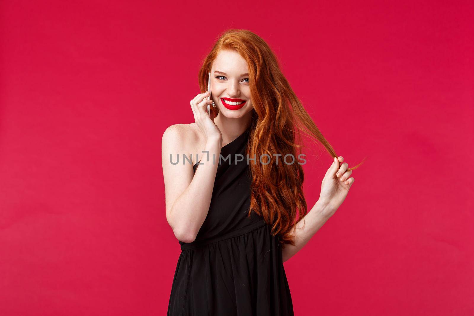 Portrait of coquettish flirty feminine redhead woman in black dress giggle while talking on phone with bae, hold smartphone near ear calling someone flirting and smiling, wear black dress by Benzoix
